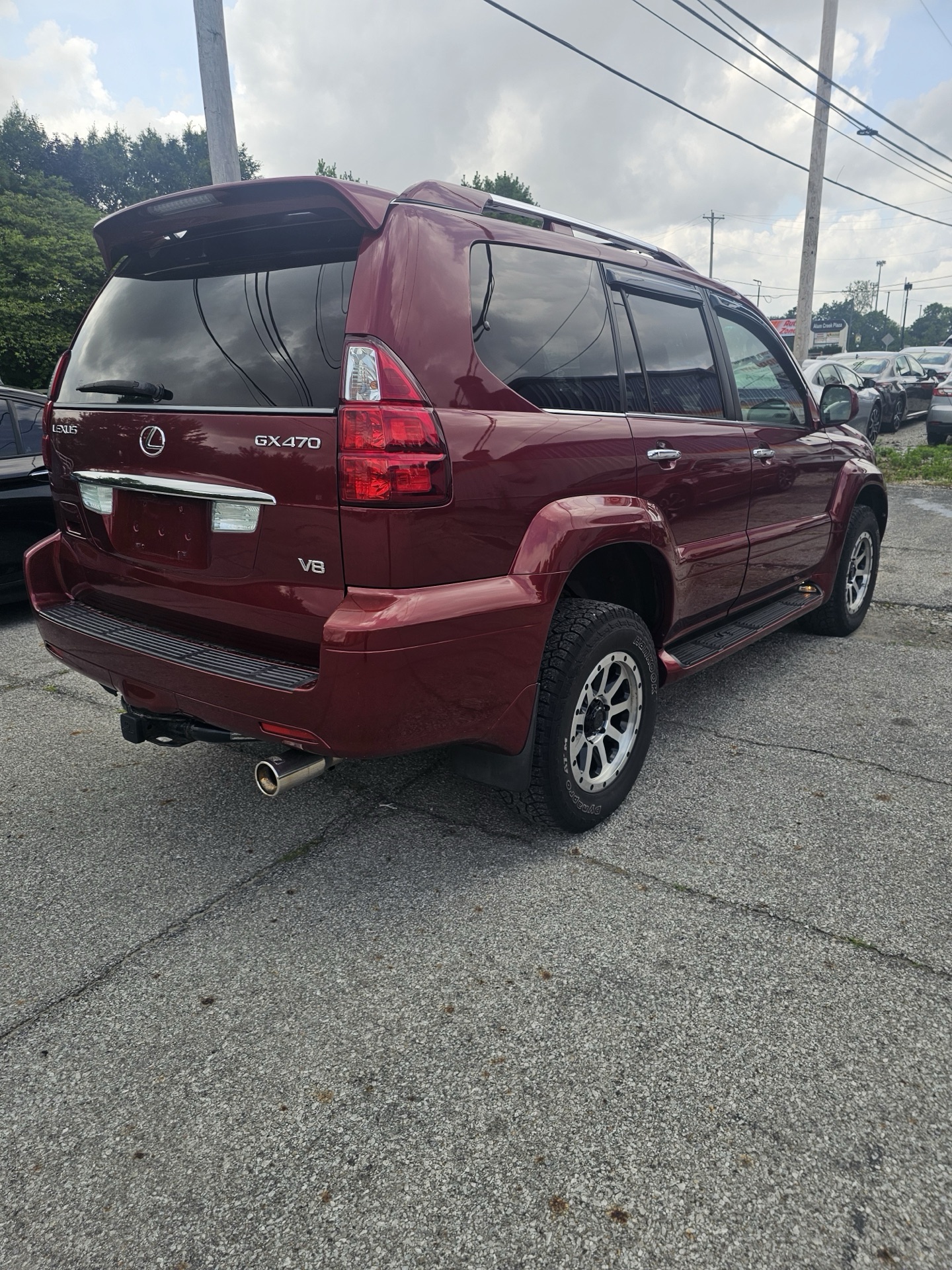 Front three-quarter view — 2008 Lexus GX 470 in dark red, marked sold